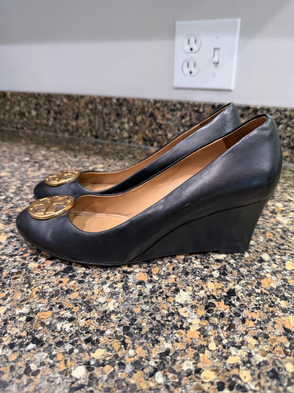 Tory Burch 7.5 
Black Leather Wedge Pumps with Gold Accent